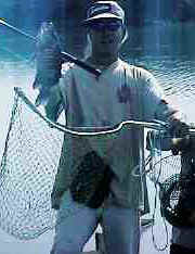 My first big mangrove snapper with Ed better fish shot.JPG (8473 bytes)